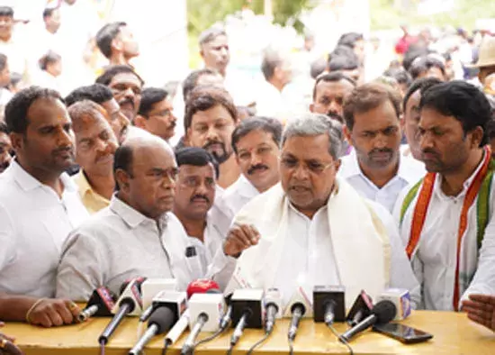 Land Scam Dogs Siddaramaiah