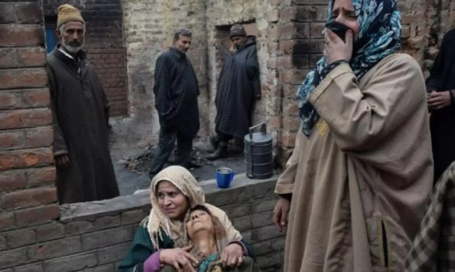 A Kashmiri Father Visits Three Graveyards to Identify His Slain Son