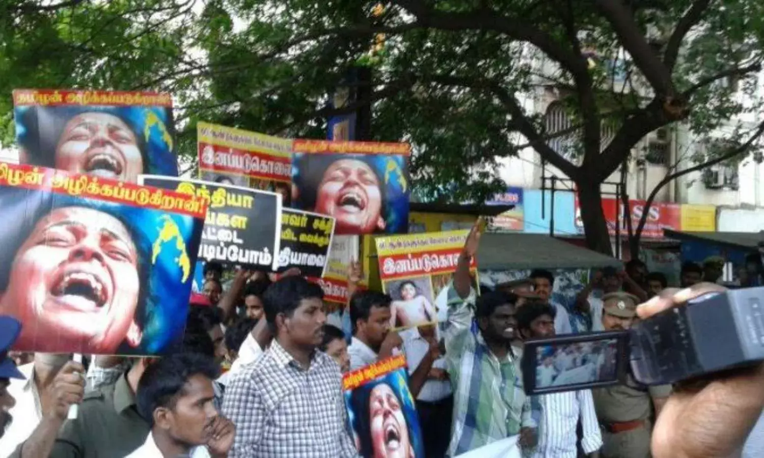 ‘War Criminal Go Back!’ Petitioners Protest Mahinda Rajapaksa Invite