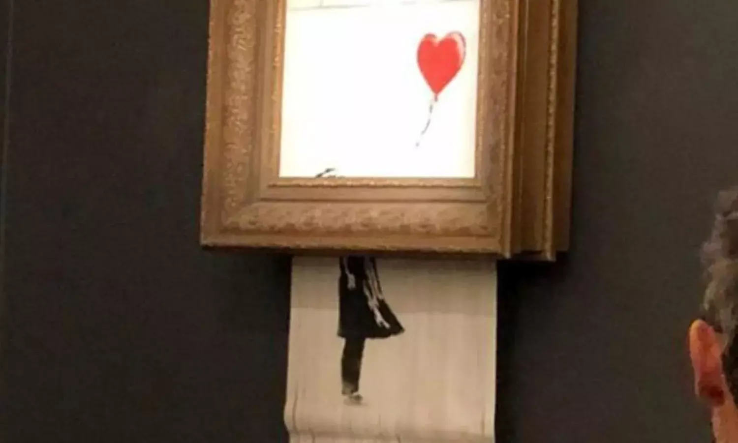 ‘Girl With A Red Balloon’ Self Destructs As Soon as It Is Sold At Sotheby’s For A Million Pounds ‘Girl With A Red Balloon’ Self Destructs As Soon as It Is Sold At Sotheby’s For A Million Pounds